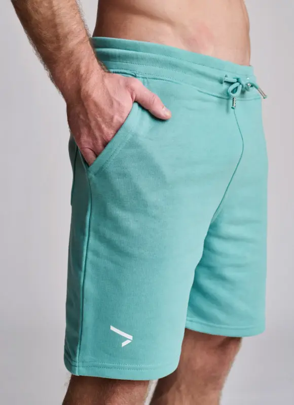 Pantalón corto chándal verde agua hombre