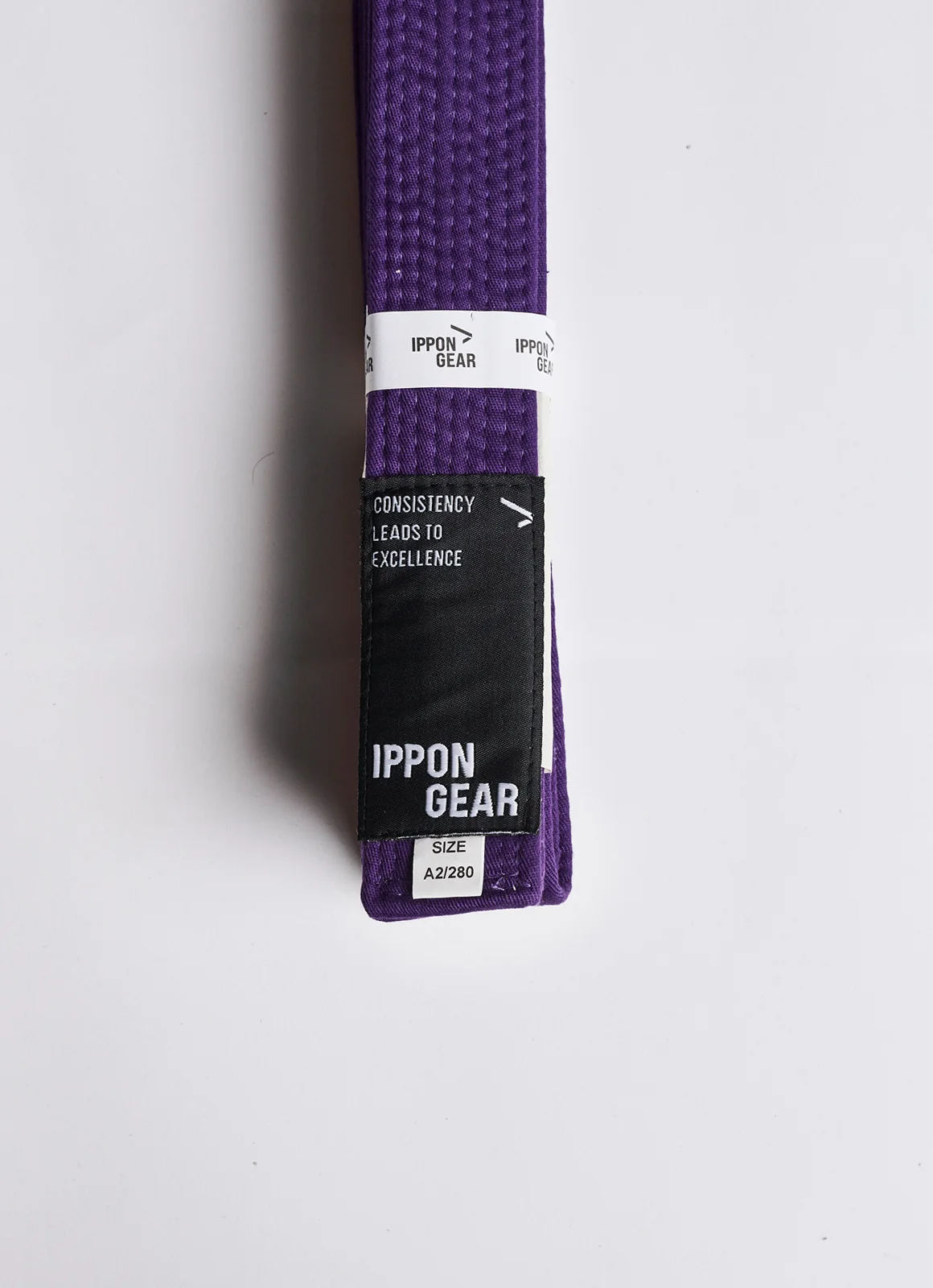 cinturón de color morado para el jiu jitsu brasileño